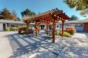 The Peninsula Post Acute patio and garden of facility